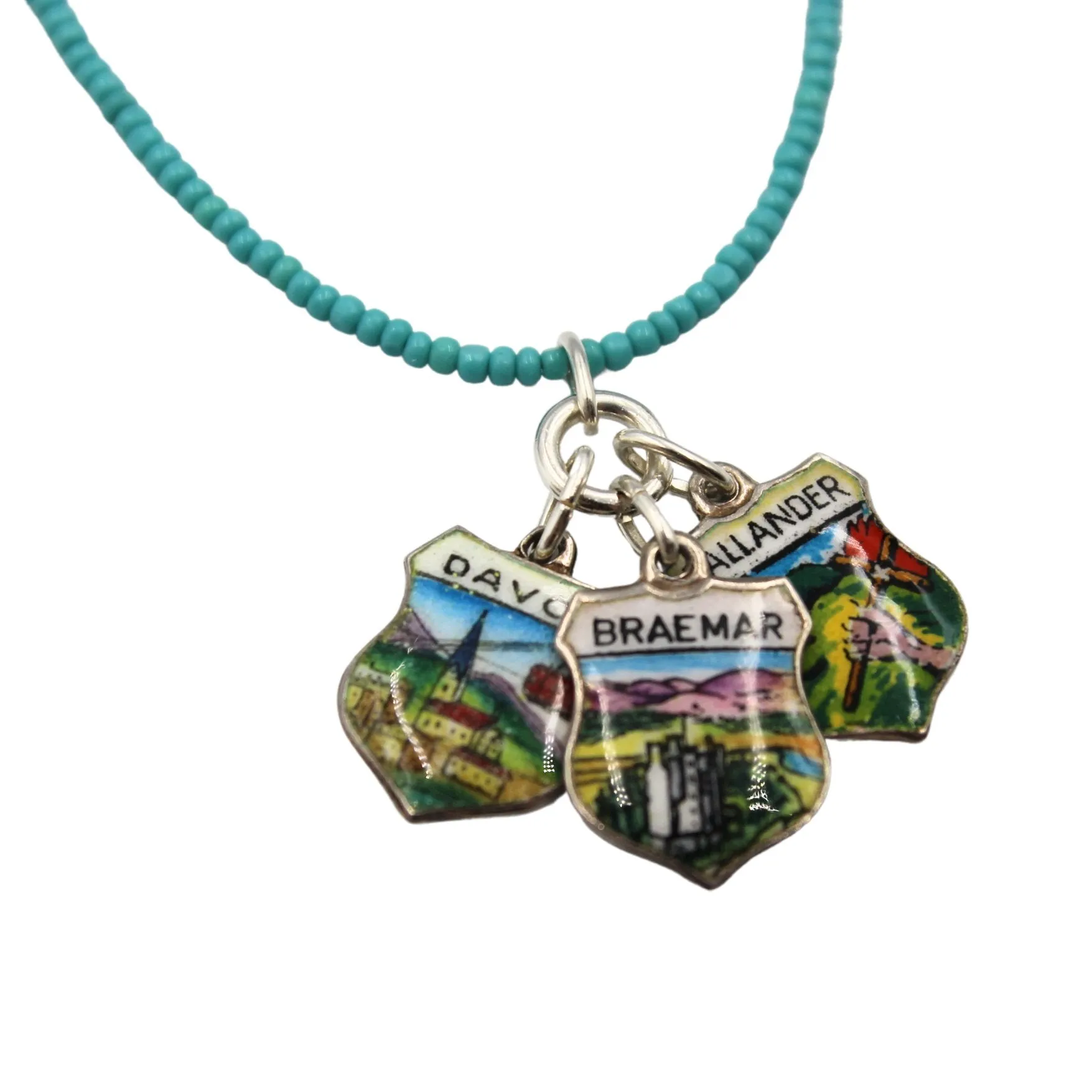 Antique Davos, Callander, and Braemar Enameled Silver Shields on a Turquoise Necklace