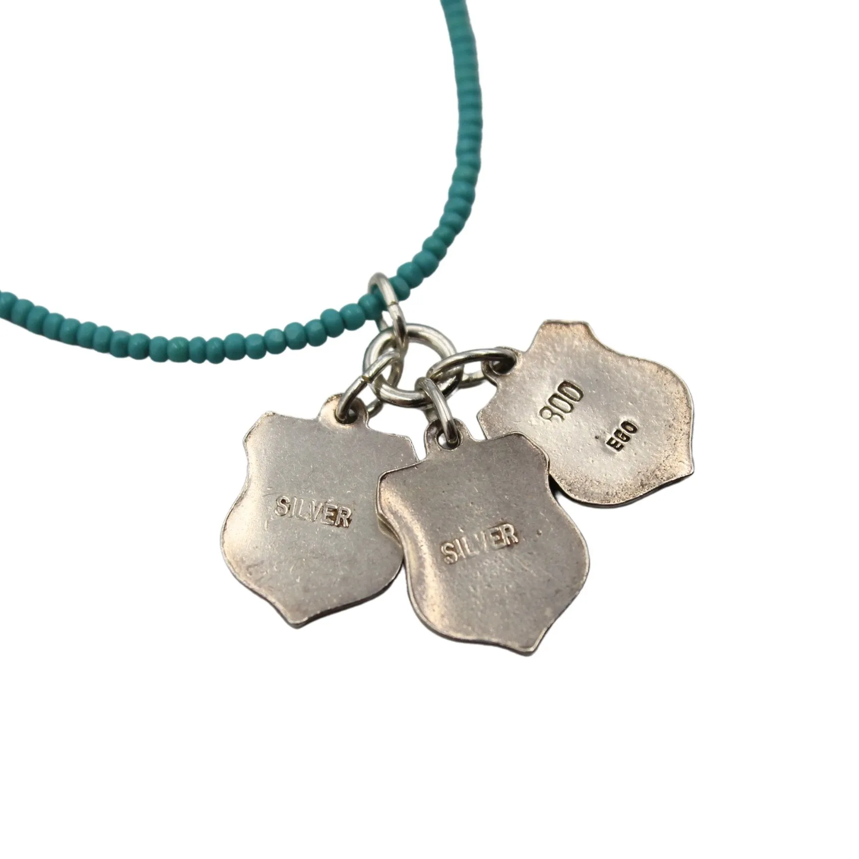 Antique Davos, Callander, and Braemar Enameled Silver Shields on a Turquoise Necklace