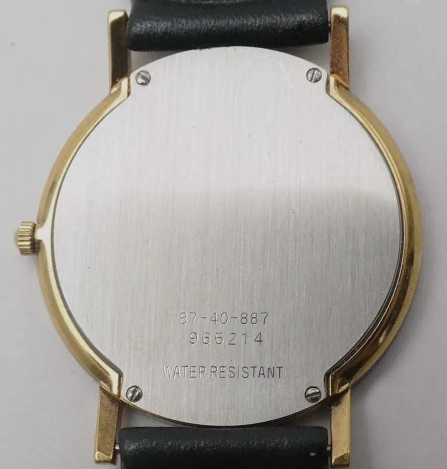Movado Black Roman Numeral Bezel 87-40-887 Mens Dress Watch....31mm