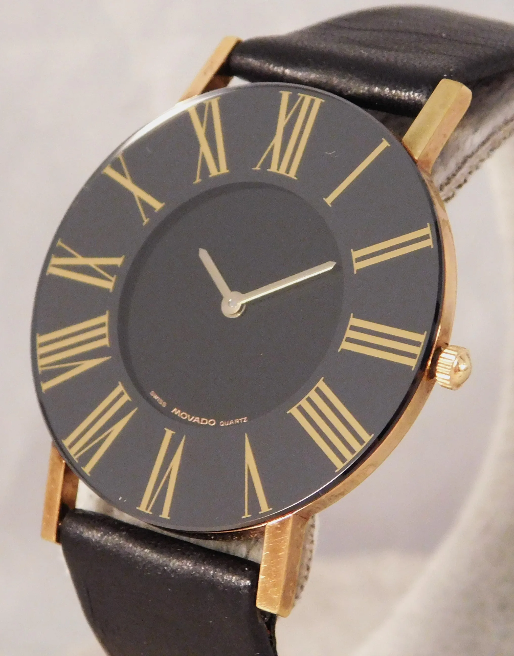 Movado Black Roman Numeral Bezel 87-40-887 Mens Dress Watch....31mm