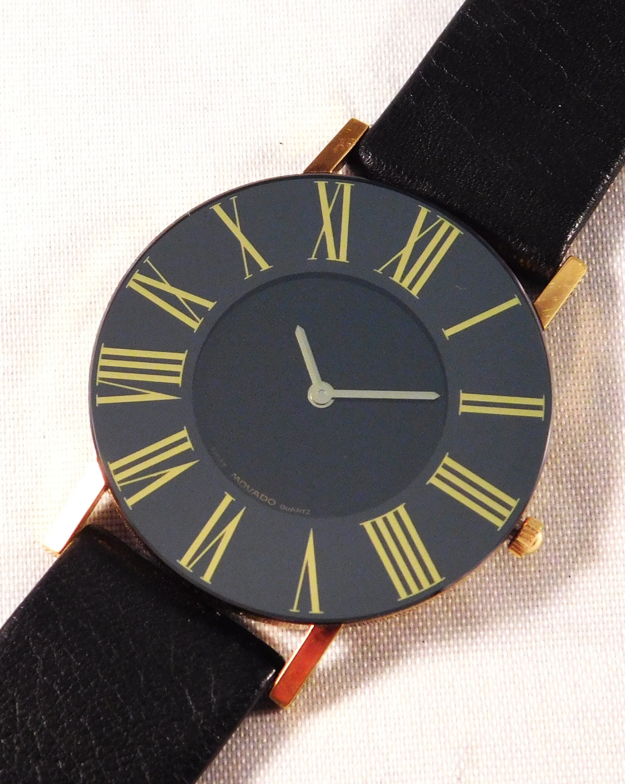 Movado Black Roman Numeral Bezel 87-40-887 Mens Dress Watch....31mm