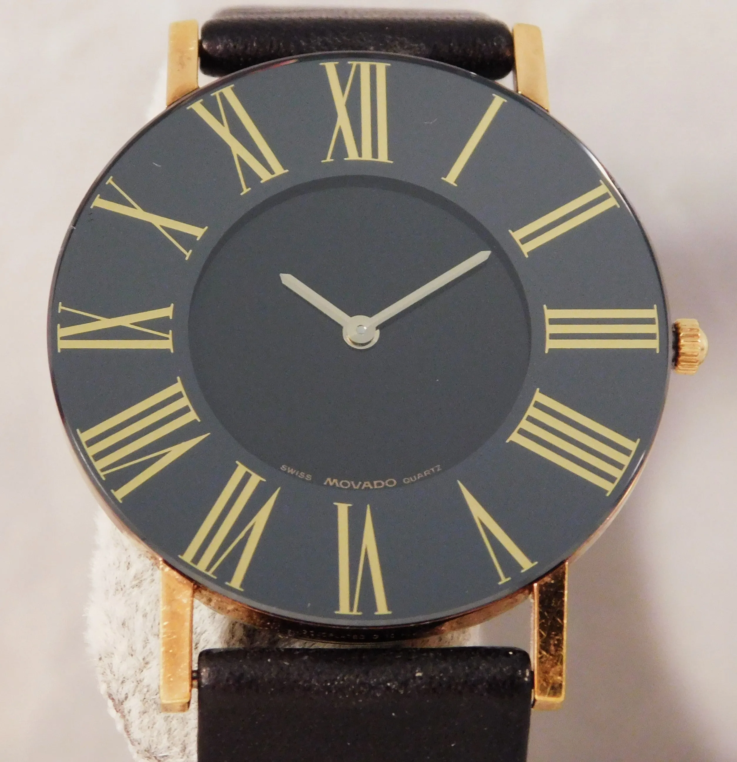 Movado Black Roman Numeral Bezel 87-40-887 Mens Dress Watch....31mm